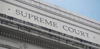 Building facade with Supreme Court signage visible